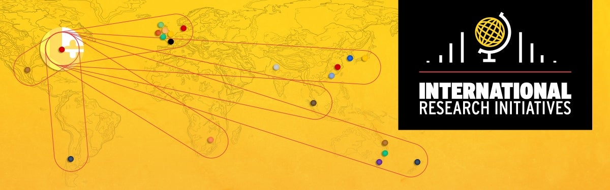 International Research Initiatives banner: a world map centered on UMD with lines reaching out to research sites around the world